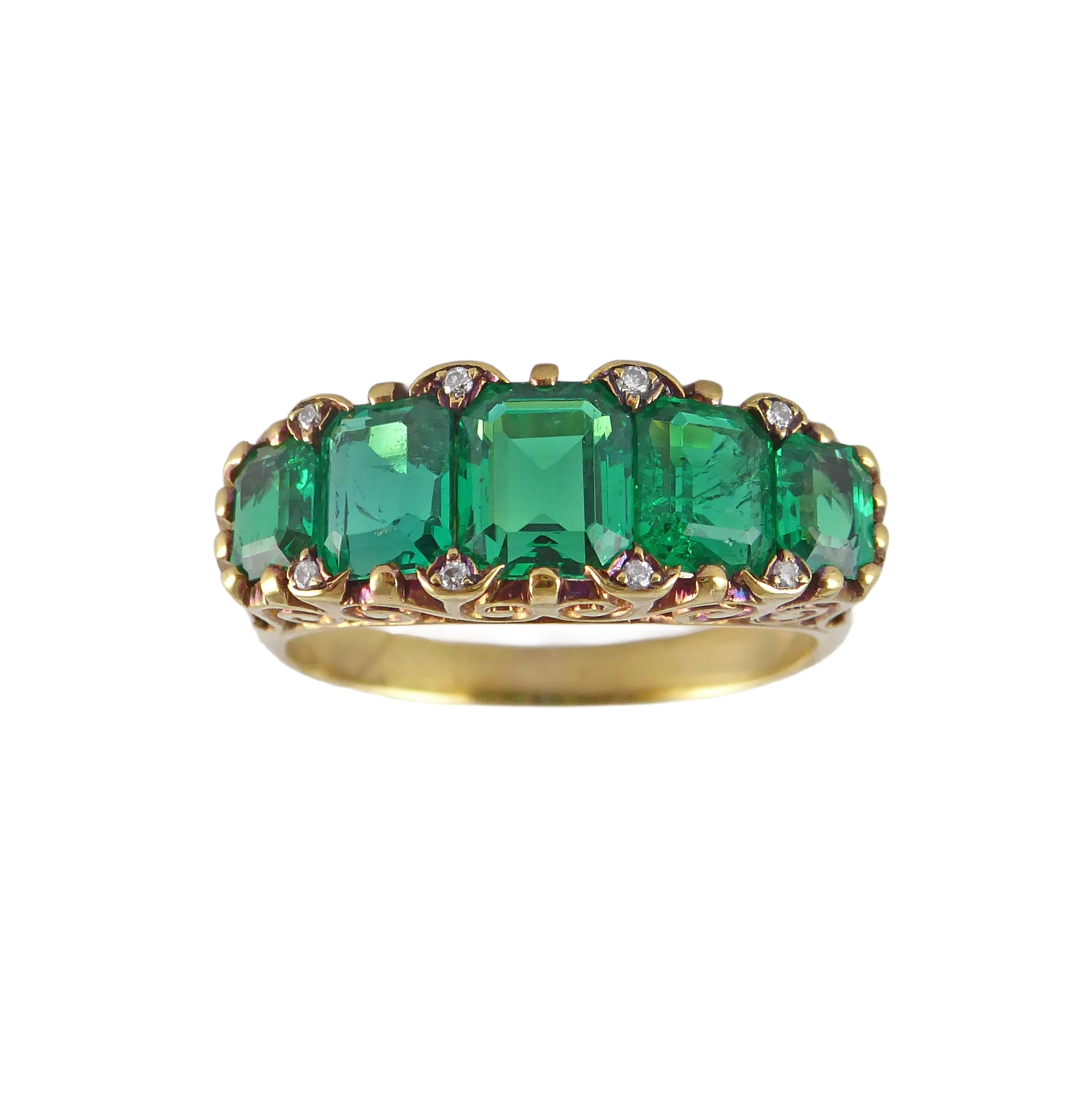 Graduated emerald five stone ring, set with step-cut canted rectangular stones, approximately 2.50cts in all,